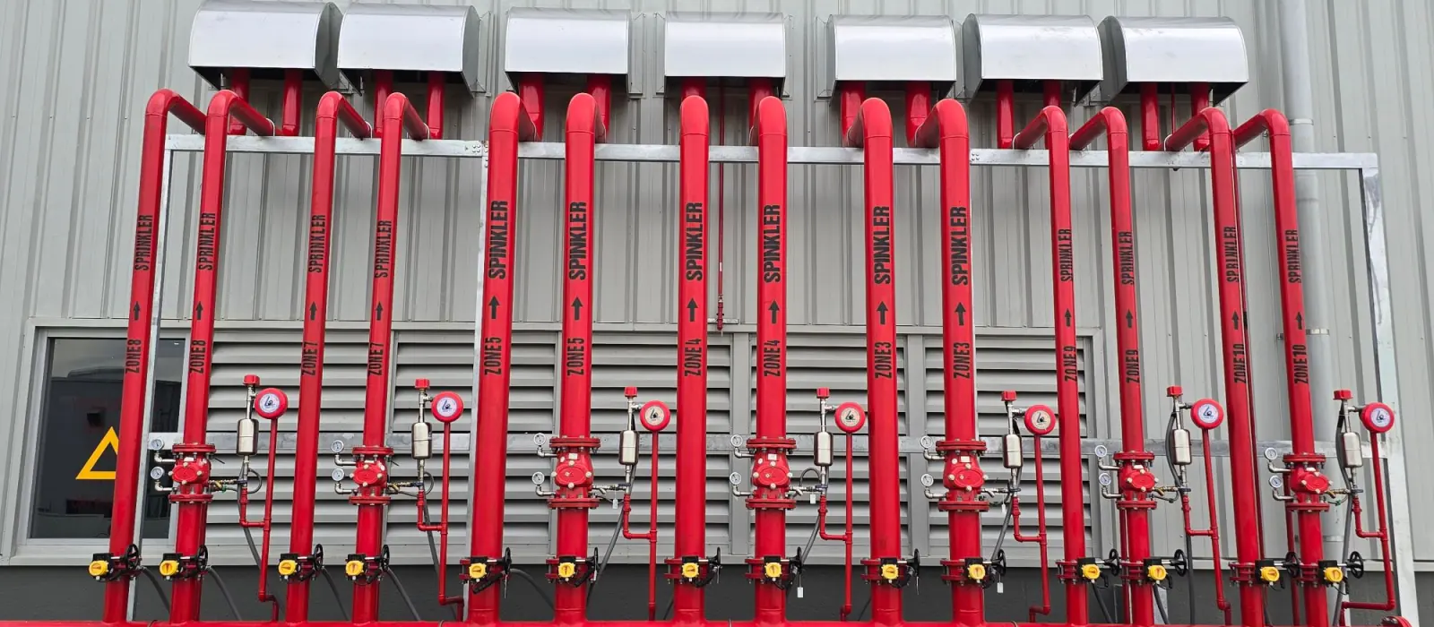 Sprinkler riser pipes and their control valves